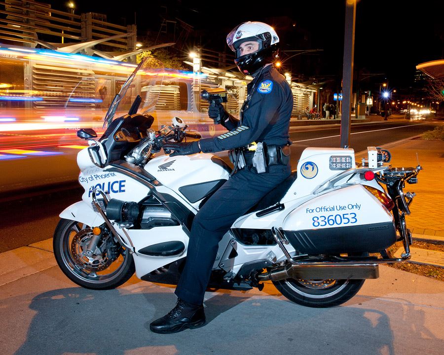 Tempe police motorcycle officer on DUI enforcement patrol
